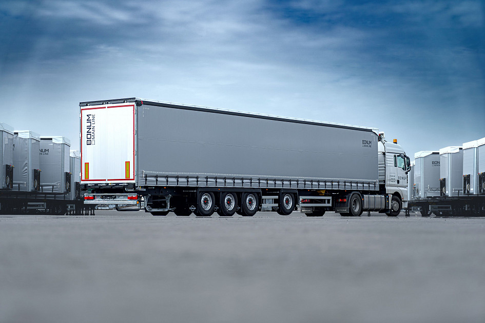 Curtain semi-trailer 16,52 m with outrigger axle